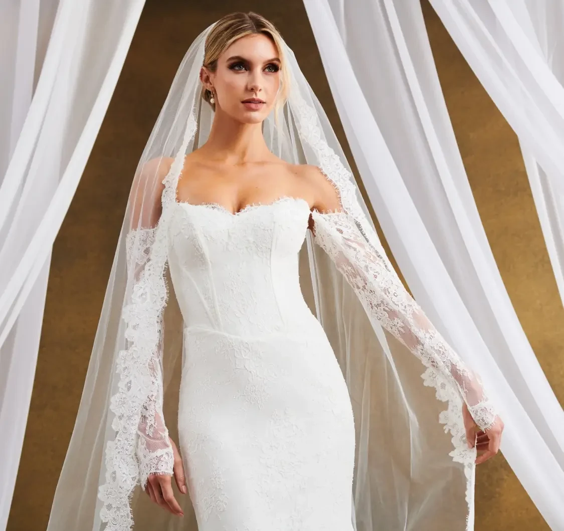Model wearing a bridal dress. Mobile image