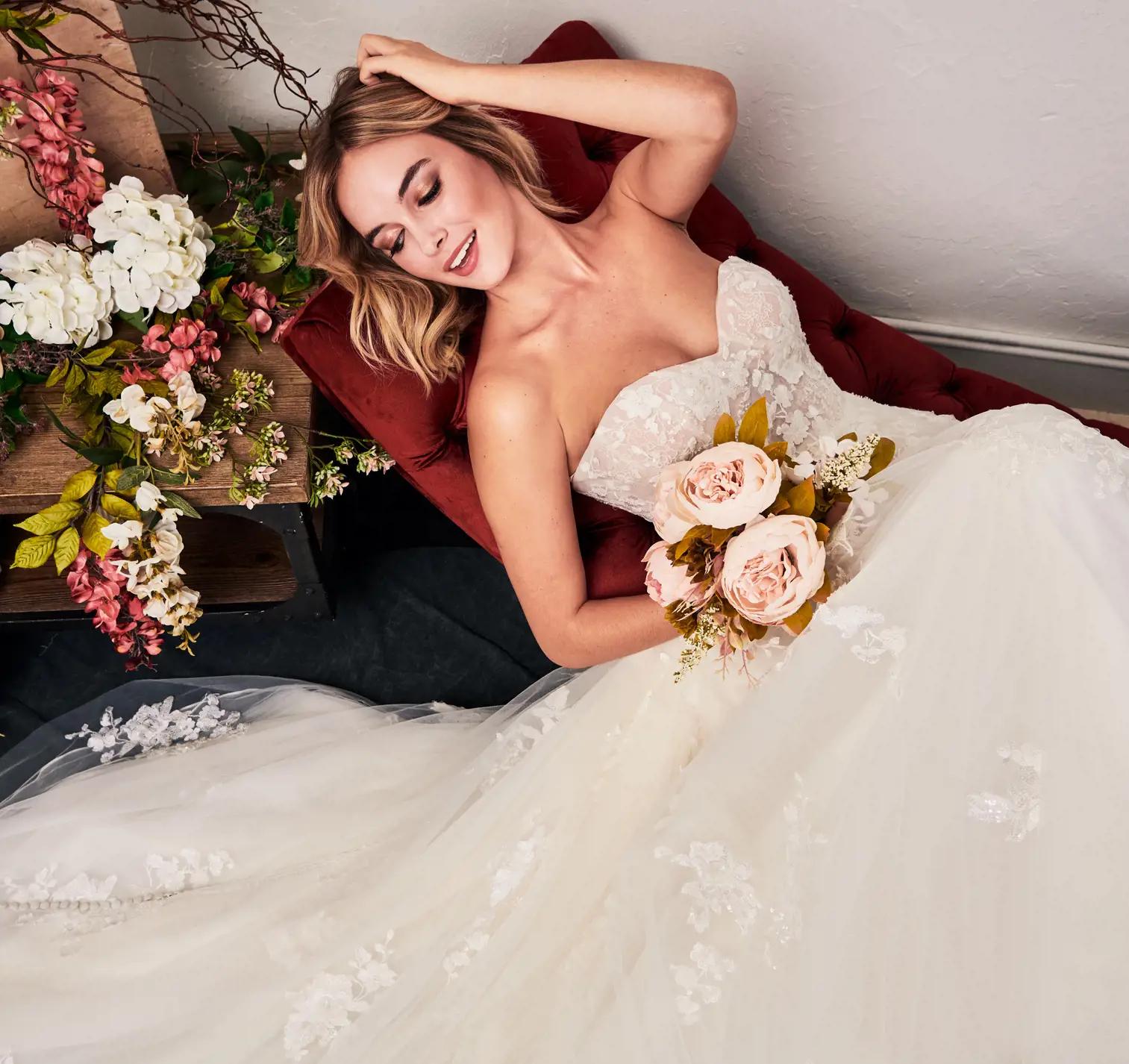 Model wearing a bridal dress. Mobile image